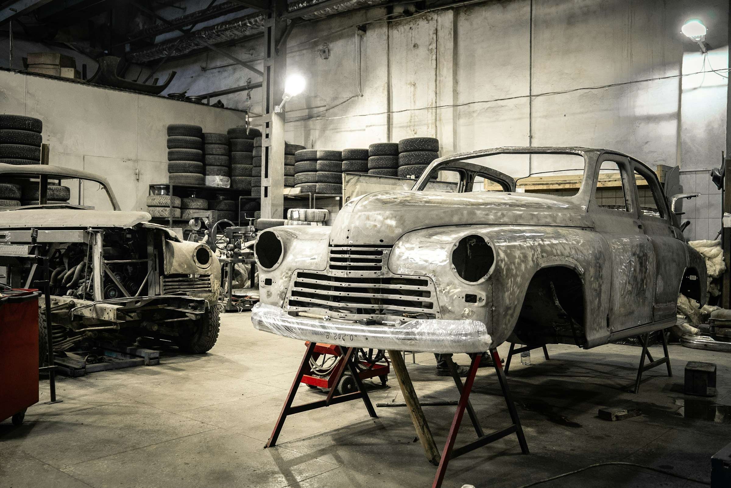 Classic car sitting in a body shop